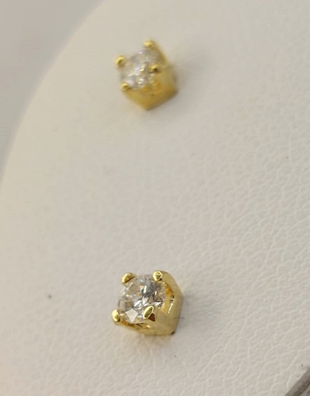 WhatsApp Image 2026-06-12 at 17.43.13s Punti luce diamanti oro giallo 18 kt